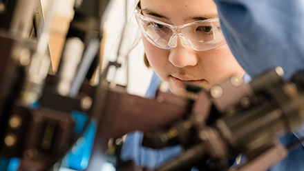 Research student working on a device